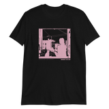 Black human shape t-shirt featuring pink graphic of a silhouetted figure in urban setting