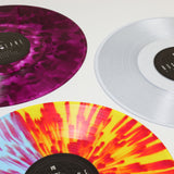 Colorful vinyl records with vibrant tie-dye patterns of Northlane Singularity Half Trans Yellow