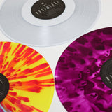 Colorful vinyl records with vibrant splatter patterns for Northlane Singularity purple cloudy LP