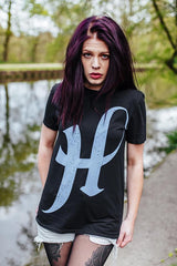 Woman with purple hair wearing the Hacktivist No Direction T-Shirt in black