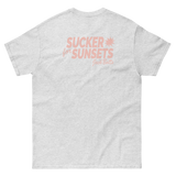 Light gray Sucker For Sunsets T-Shirt with pink print on the back