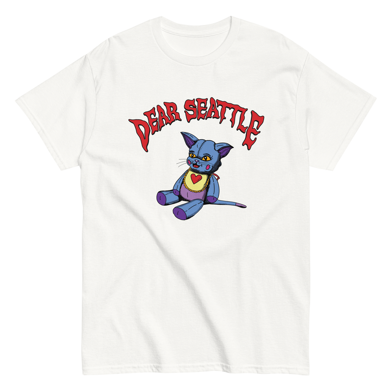 White T-shirt with cartoon blue cat and red Dear Seattle text, featuring Cat Doll design